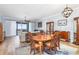 Open living space with dining table, hardwood floors and access to outdoor balcony at 91 Vivante Blvd # 402/9142, Punta Gorda, FL 33950