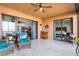 Relaxing outdoor patio with views of both the living room and bedroom through sliding glass doors at 91 Vivante Blvd # 402/9142, Punta Gorda, FL 33950