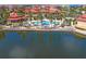 Gorgeous pool area with lush landscaping and comfortable lounging, perfect for relaxation and entertainment at 91 Vivante Blvd # 402/9142, Punta Gorda, FL 33950