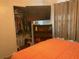 Bedroom with large closet and TV at 12077 Maryland Ave, Punta Gorda, FL 33955