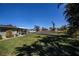 Landscaped backyard with canal access and boat slip at 125 Ott Cir, Port Charlotte, FL 33952