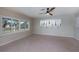 Gathering room with tile floors and water views at 125 Ott Cir, Port Charlotte, FL 33952