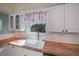 Kitchen with butcher block countertops and white cabinets at 125 Ott Cir, Port Charlotte, FL 33952