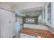 Modern kitchen with butcher block countertops and stainless steel appliances at 125 Ott Cir, Port Charlotte, FL 33952