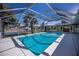 Enclosed rectangular pool with canal view at 125 Ott Cir, Port Charlotte, FL 33952