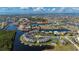 Gorgeous aerial perspective of a waterfront community featuring numerous canals and residences with boat docks at 1335 Rock Dove Ct # 52, Punta Gorda, FL 33950