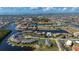 Wonderful aerial perspective of a waterfront community featuring numerous canals and residences with boat docks at 1335 Rock Dove Ct # 52, Punta Gorda, FL 33950