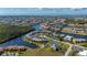 Expansive aerial view of a waterfront community featuring numerous canals and residences with boat docks at 1335 Rock Dove Ct # 52, Punta Gorda, FL 33950