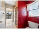 Bathroom featuring a glass-enclosed shower and a window to the backyard at 1335 Rock Dove Ct # 52, Punta Gorda, FL 33950