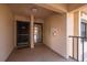 Close up of condo entrance with neutral tones and showing entry door at 1335 Rock Dove Ct # 52, Punta Gorda, FL 33950