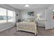 Bright bedroom showcasing a white bed frame, plush carpeting, and a serene atmosphere at 16300 Coconut Palm Dr, Port Charlotte, FL 33953