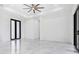 Spacious living room with high ceilings and tile floors at 17200 Mint Ln, Punta Gorda, FL 33955