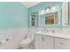 Clean bathroom featuring updated vanity, and bright lighting, creating a functional and pleasant space at 18181 Bly Ave, Port Charlotte, FL 33948