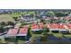 Overhead shot of villas featuring water views and community access to a golf course and parking at 1890 Deborah Dr # 6, Punta Gorda, FL 33950