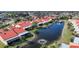 Beautiful lakefront homes with easy access to community amenities, creating a resort-like living experience at 1890 Deborah Dr # 6, Punta Gorda, FL 33950