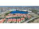 Expansive aerial shot of a waterfront residential community with red roofs, highlighting the serene water features at 1890 Deborah Dr # 6, Punta Gorda, FL 33950