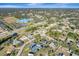 Wide aerial view of a community, nearby a commercial area, offering easy access to amenities and services at 20352 Tappan Zee Dr, Port Charlotte, FL 33952