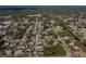 Neighborhood aerial view, showcasing well-maintained homes with mature landscaping, highlighting the area's charm at 20431 Calder Ave, Port Charlotte, FL 33954