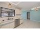 Kitchen featuring stainless steel appliances and a window overlooking the lanai and pool at 20431 Calder Ave, Port Charlotte, FL 33954