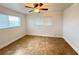 Spacious bedroom with tile flooring and neutral walls at 21157 Midway Blvd, Port Charlotte, FL 33952