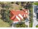 Aerial view of house showing orange tile roof and landscaping at 21370 Harborside Blvd, Port Charlotte, FL 33952