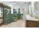 Spa-like bathroom with a large walk-in shower and double vanity at 21370 Harborside Blvd, Port Charlotte, FL 33952