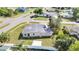 Aerial view of the property showing the fenced yard, exterior, and proximity to the street at 21402 Meehan Ave, Port Charlotte, FL 33952