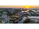 Waterfront property with sunset view, private dock, and boat lift at 24248 Treasure Island Blvd, Punta Gorda, FL 33955