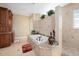 Spa-like bathroom with soaking tub and walk-in shower at 24248 Treasure Island Blvd, Punta Gorda, FL 33955