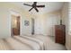 Spacious bedroom with ample closet space and a shared bathroom at 24248 Treasure Island Blvd, Punta Gorda, FL 33955