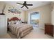 Serene bedroom with balcony and water views at 24248 Treasure Island Blvd, Punta Gorda, FL 33955