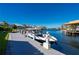 Private boat dock with covered slips and ample space for multiple watercraft at 24248 Treasure Island Blvd, Punta Gorda, FL 33955