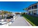 Walkway to the boat dock with boats parked at 24248 Treasure Island Blvd, Punta Gorda, FL 33955