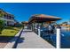 Private dock with covered boat slips and a spacious walkway at 24248 Treasure Island Blvd, Punta Gorda, FL 33955