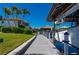 Waterfront property featuring a private boat dock with a covered lift, providing direct access to the water and boating activities at 24248 Treasure Island Blvd, Punta Gorda, FL 33955