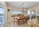 Breakfast nook with water views and elegant chandelier at 24248 Treasure Island Blvd, Punta Gorda, FL 33955