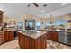 Kitchen with island, granite countertops, and wine cooler at 24248 Treasure Island Blvd, Punta Gorda, FL 33955