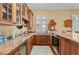 Kitchen with granite countertops and wooden cabinetry at 24248 Treasure Island Blvd, Punta Gorda, FL 33955