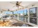 Screened lanai overlooking the canal providing a relaxing outdoor living space at 24343 Pirate Harbor Blvd, Punta Gorda, FL 33955