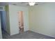 Bedroom with ensuite bathroom and ceiling fan at 26376 Nadir Rd # 301, Punta Gorda, FL 33983