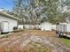 Backyard with shed and chicken coop at 2771 Siesta Dr, Venice, FL 34293