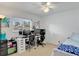 Home office with two work stations and window at 2771 Siesta Dr, Venice, FL 34293