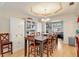 Dining room featuring a large table and built-in hutch at 2771 Siesta Dr, Venice, FL 34293