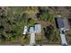 Aerial view showing house, RV, and surrounding land at 28094 Chinquapin Dr, Punta Gorda, FL 33955