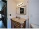 Bathroom with vanity, sink, and mirror at 28094 Chinquapin Dr, Punta Gorda, FL 33955