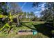 Landscaped garden featuring a raised garden bed at 28094 Chinquapin Dr, Punta Gorda, FL 33955