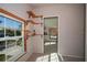 Hallway with window and built-in shelves at 28094 Chinquapin Dr, Punta Gorda, FL 33955