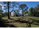 Two-story house with grassy backyard at 28094 Chinquapin Dr, Punta Gorda, FL 33955