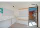 Workshop with pegboard walls and shelves at 28094 Chinquapin Dr, Punta Gorda, FL 33955
