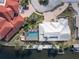 Bird's eye view of home, pool, and private dock at 298 Fry Se Ter, Port Charlotte, FL 33952